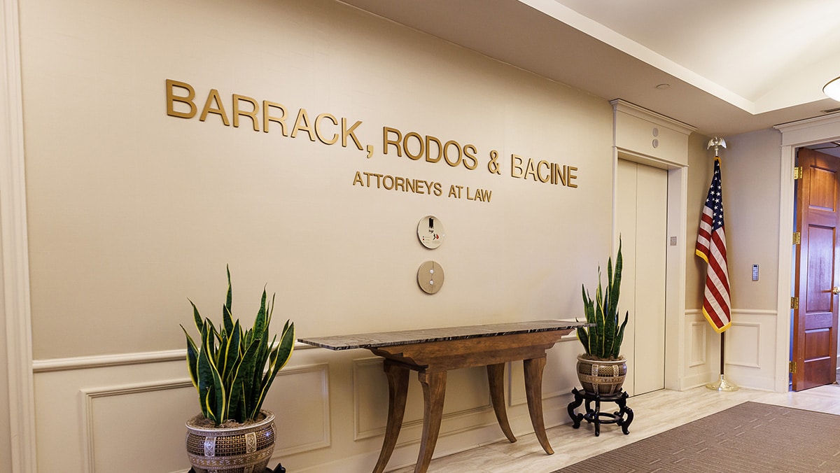 Barrack Rodos & Bacine wall sign in hallway
